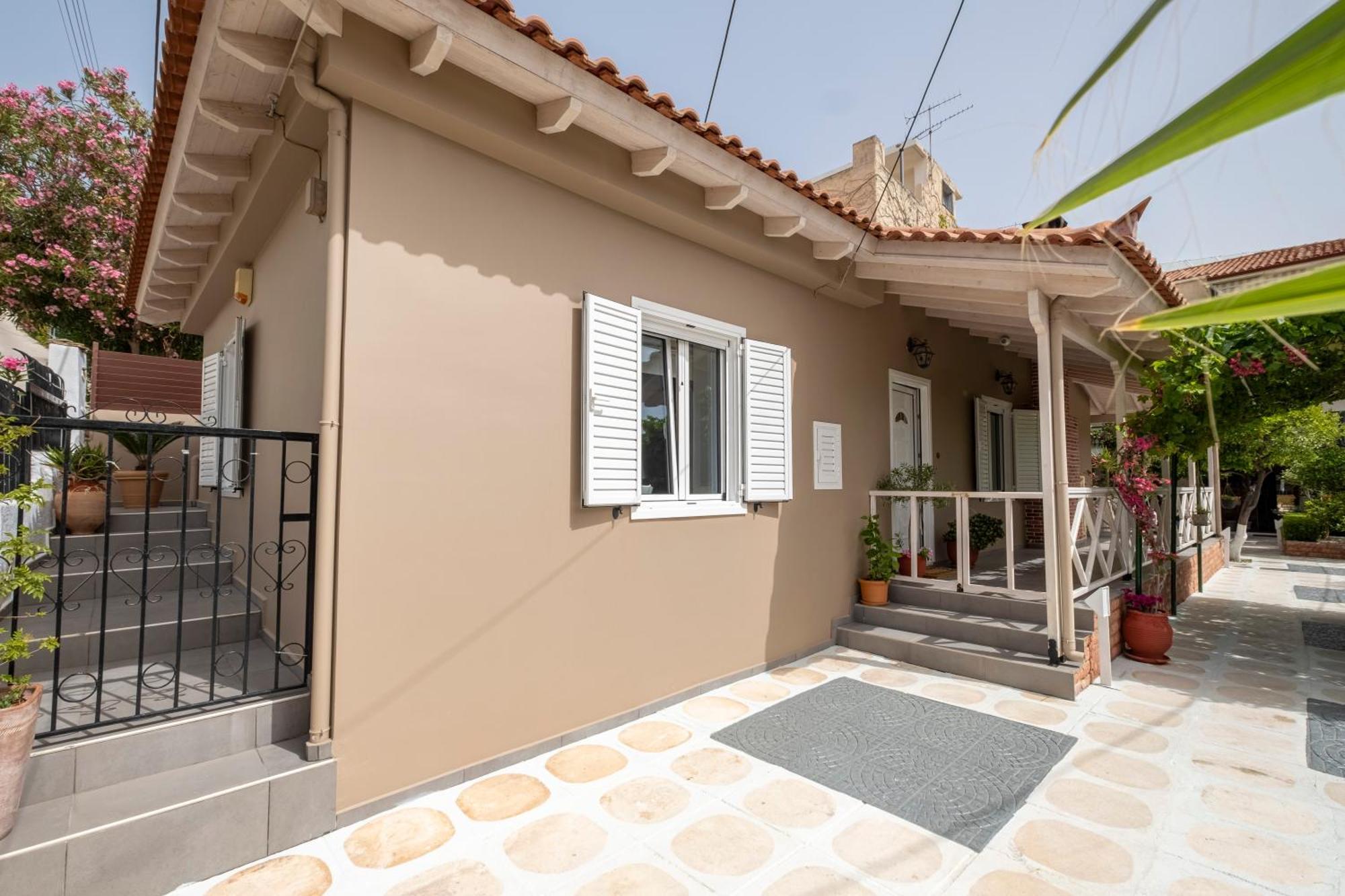 Oasis Home Tolo Bagian luar foto