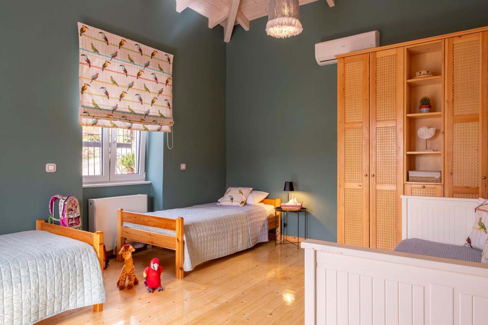 Oasis Home Tolo Bagian luar foto