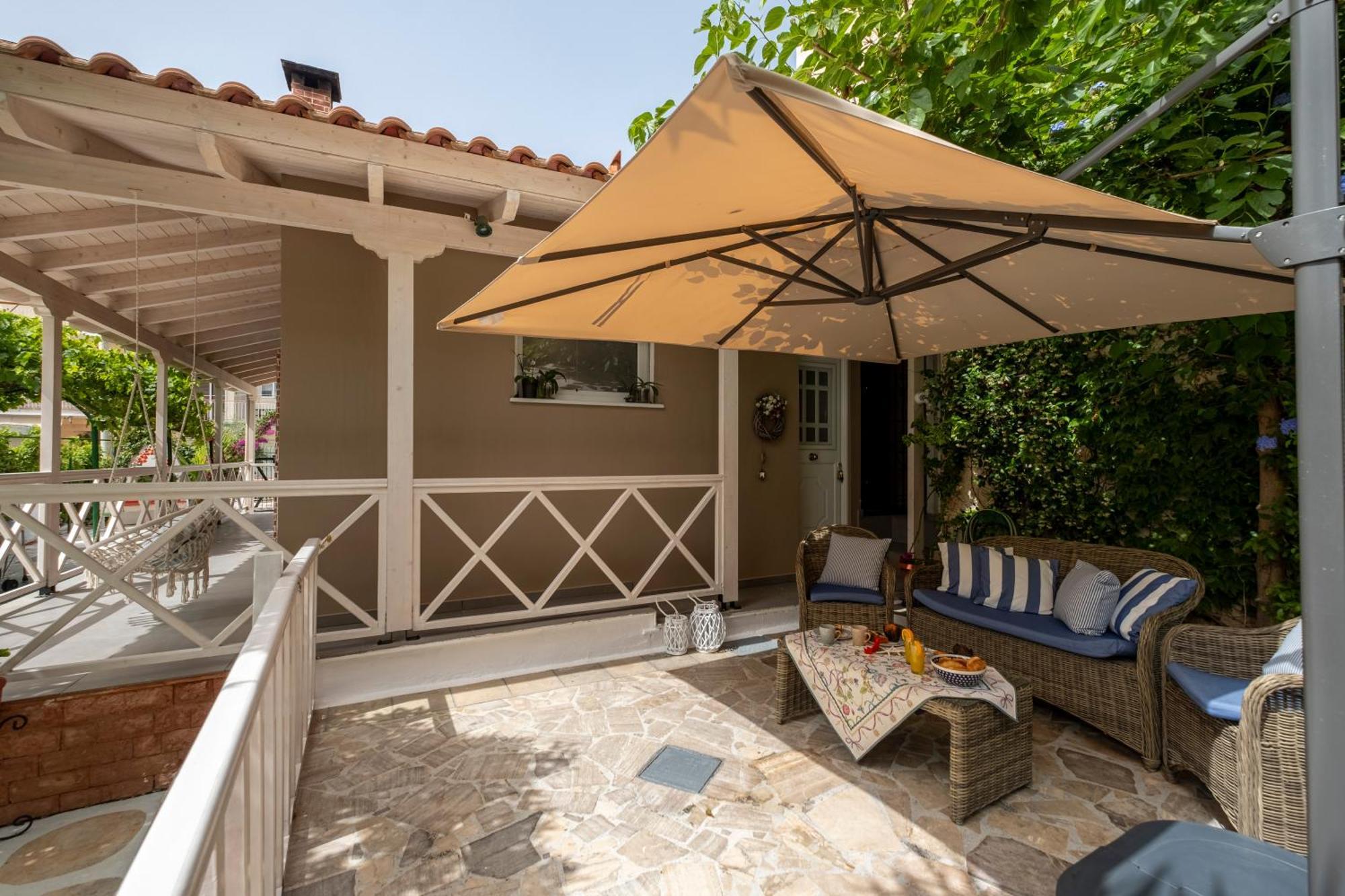 Oasis Home Tolo Bagian luar foto