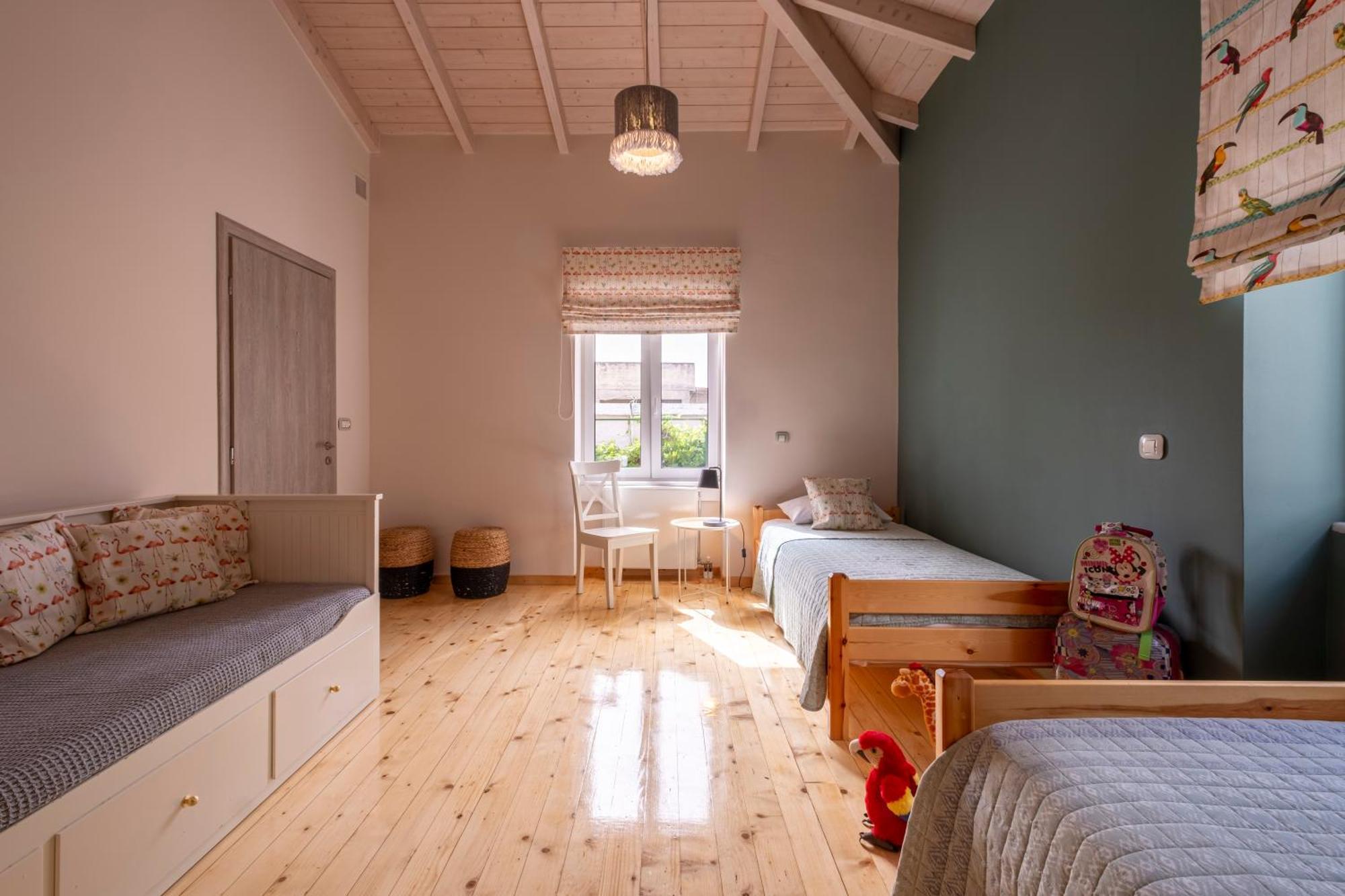 Oasis Home Tolo Bagian luar foto