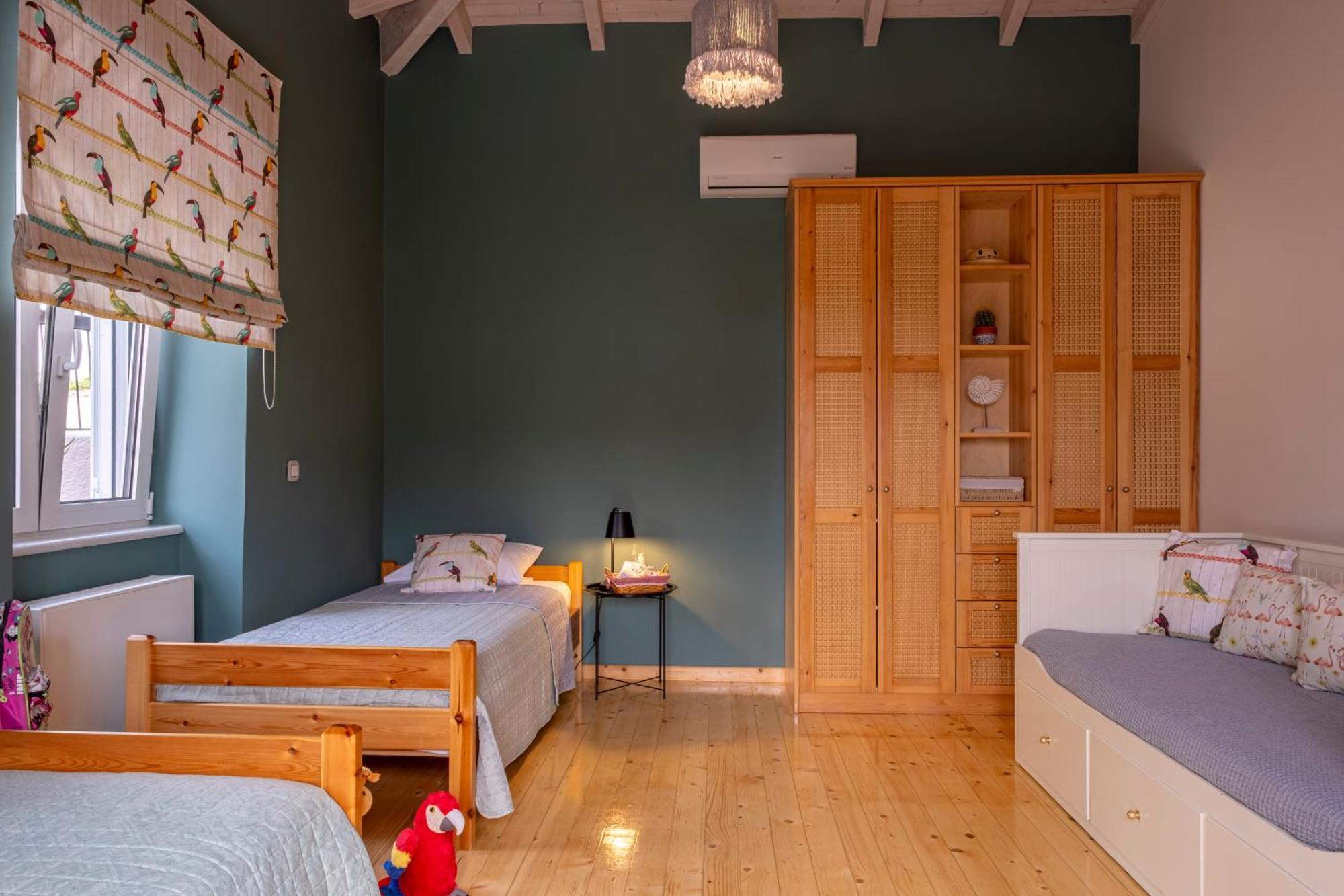 Oasis Home Tolo Bagian luar foto