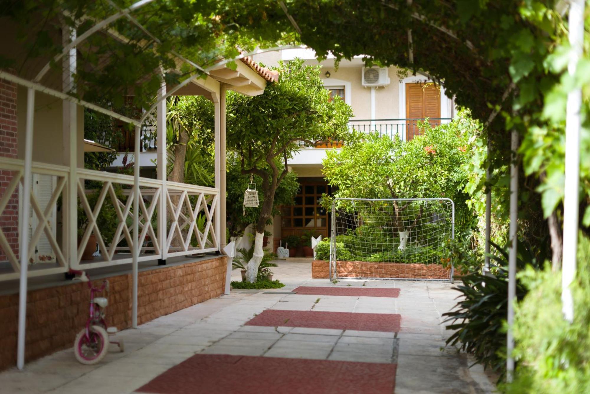 Oasis Home Tolo Bagian luar foto
